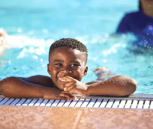 School Age students taking Water Acclamation swim lesson classes at the Y!