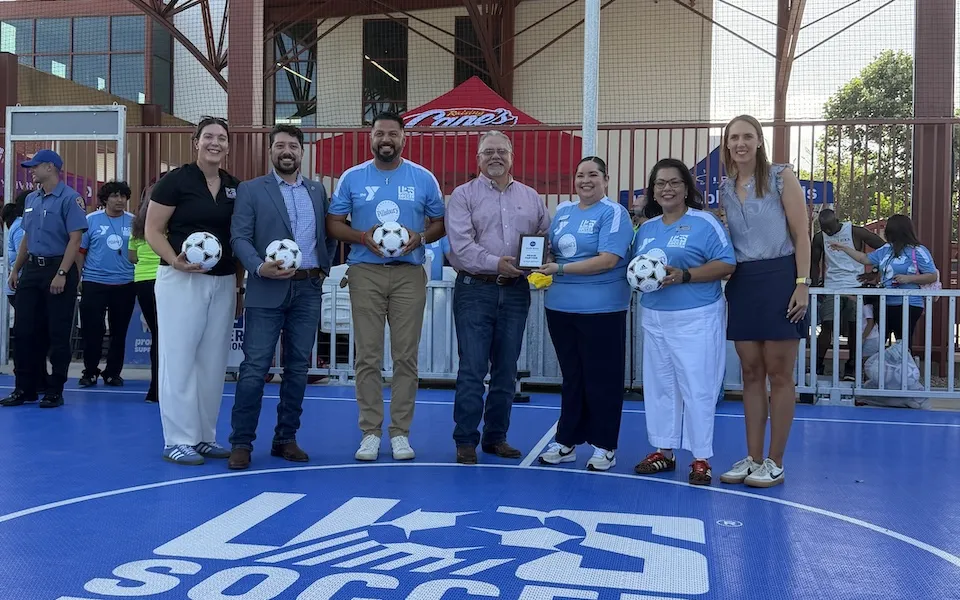 Y Staff At the new soccer pitch at the Harvey E. Najim YMCA